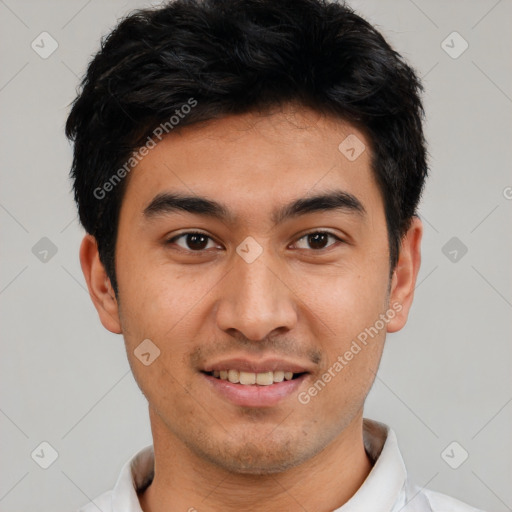 Joyful white young-adult male with short  black hair and brown eyes