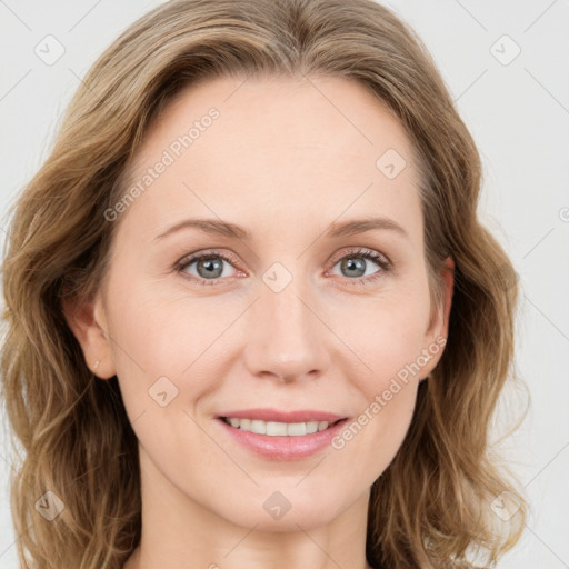 Joyful white young-adult female with medium  brown hair and green eyes