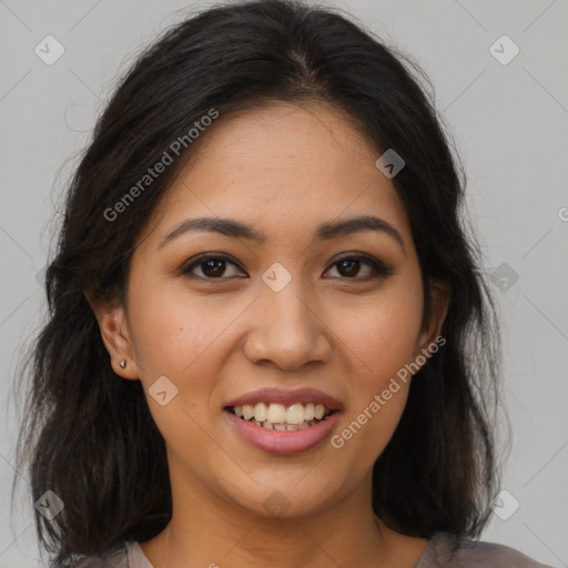 Joyful latino young-adult female with medium  brown hair and brown eyes