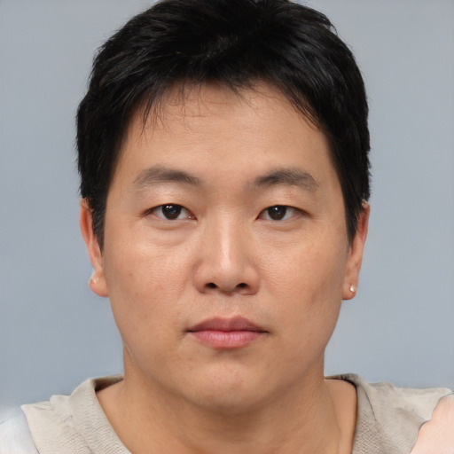 Neutral asian young-adult male with short  black hair and brown eyes