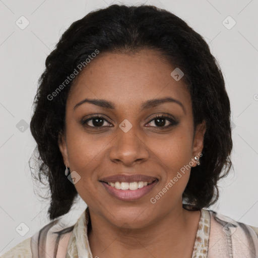 Joyful black young-adult female with long  brown hair and brown eyes