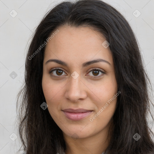 Joyful latino young-adult female with long  brown hair and brown eyes