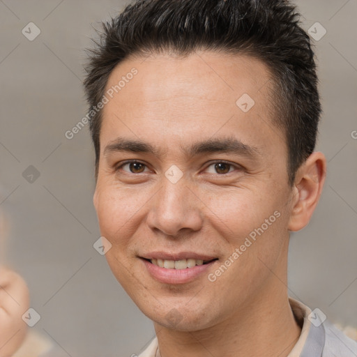 Joyful white adult male with short  brown hair and brown eyes