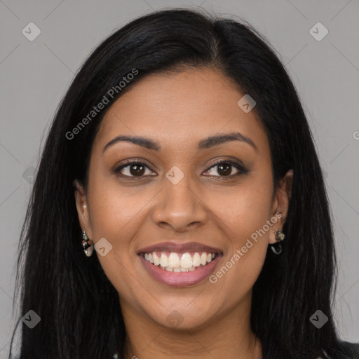 Joyful latino young-adult female with long  brown hair and brown eyes