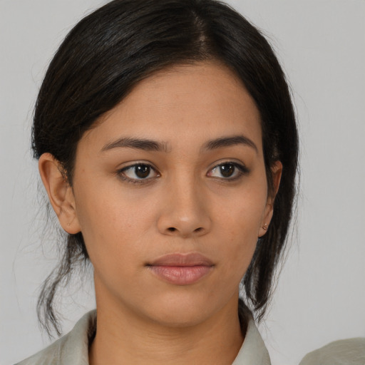 Neutral asian young-adult female with medium  brown hair and brown eyes