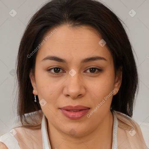 Joyful latino young-adult female with long  brown hair and brown eyes