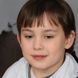 Joyful white child female with short  brown hair and brown eyes