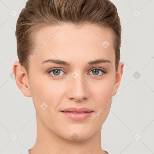 Joyful white young-adult female with short  brown hair and grey eyes