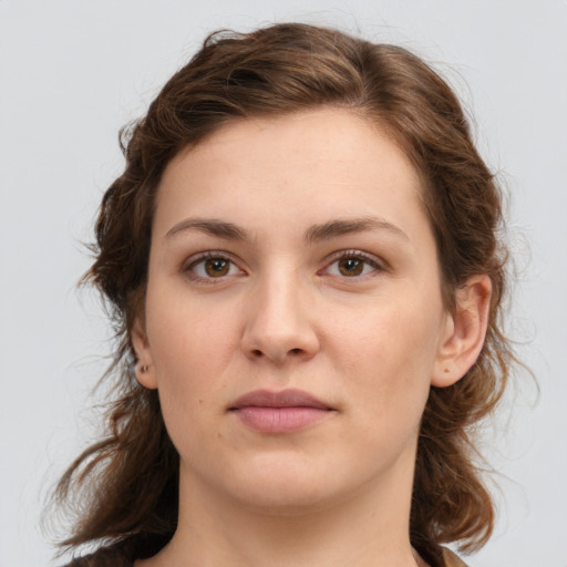 Neutral white young-adult female with medium  brown hair and grey eyes