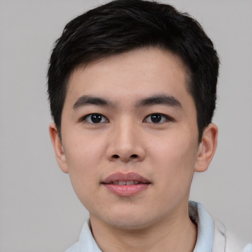 Neutral asian young-adult male with short  black hair and brown eyes