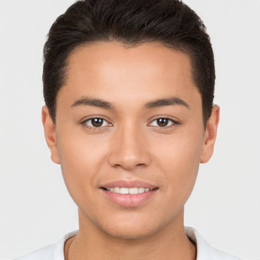 Joyful white young-adult male with short  brown hair and brown eyes