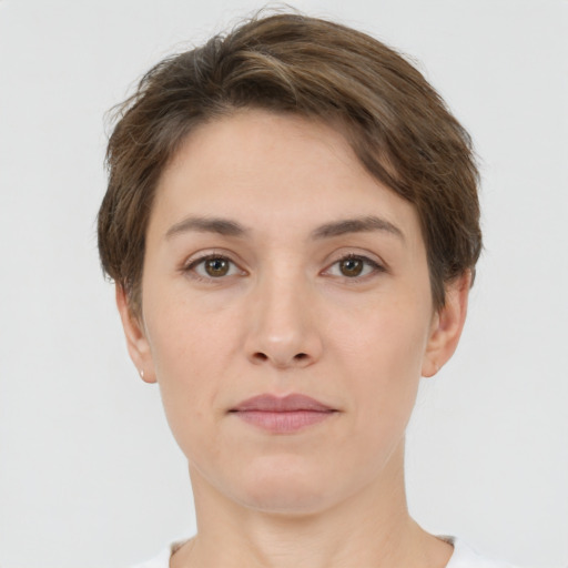 Neutral white young-adult female with short  brown hair and brown eyes