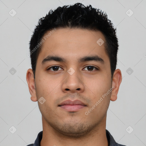 Neutral latino young-adult male with short  black hair and brown eyes