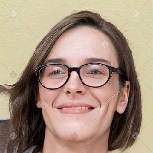 Joyful white adult female with medium  brown hair and blue eyes