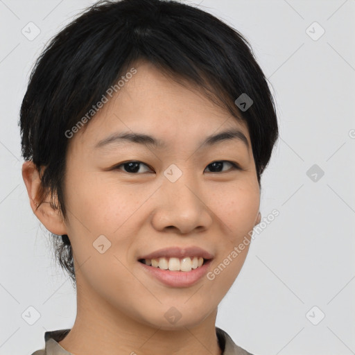 Joyful asian young-adult female with short  brown hair and brown eyes