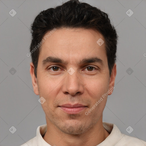 Joyful white adult male with short  brown hair and brown eyes