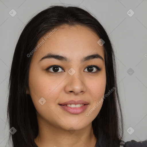 Joyful latino young-adult female with long  brown hair and brown eyes