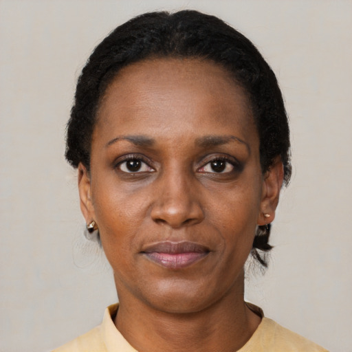 Neutral black young-adult female with short  black hair and brown eyes