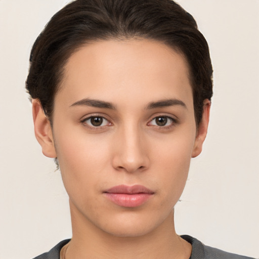 Neutral white young-adult female with short  brown hair and brown eyes