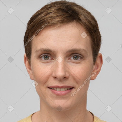 Joyful white young-adult female with short  brown hair and grey eyes