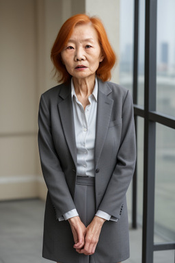 Chinese elderly female with  ginger hair