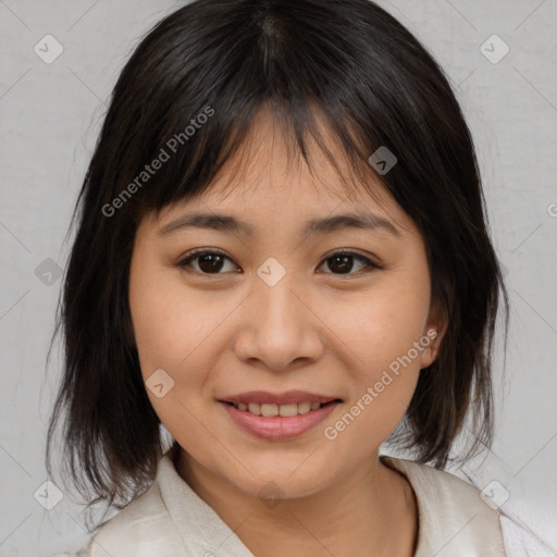 Joyful asian young-adult female with medium  brown hair and brown eyes