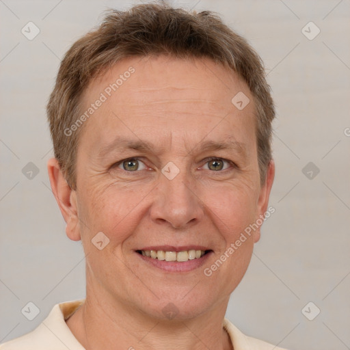 Joyful white adult male with short  brown hair and grey eyes