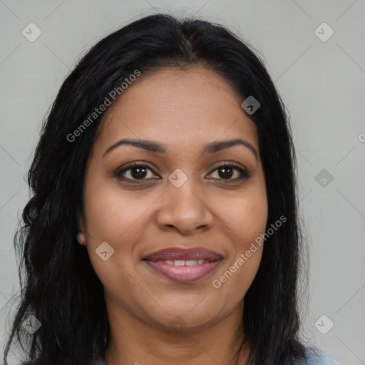 Joyful latino young-adult female with long  brown hair and brown eyes
