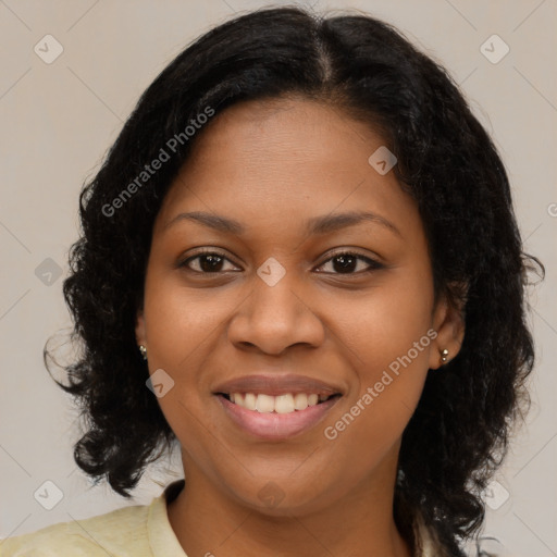 Joyful black young-adult female with medium  brown hair and brown eyes