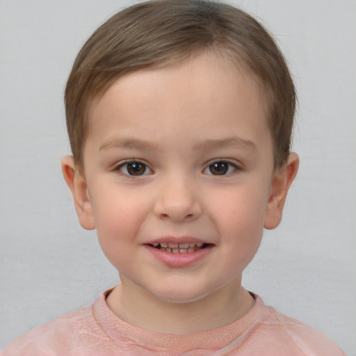 Joyful white child female with short  brown hair and brown eyes