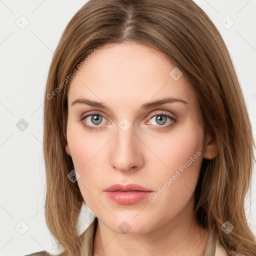 Neutral white young-adult female with long  brown hair and green eyes