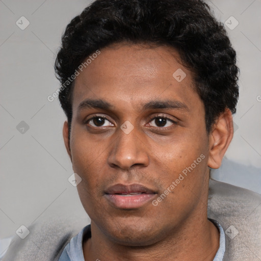 Neutral latino young-adult male with short  black hair and brown eyes