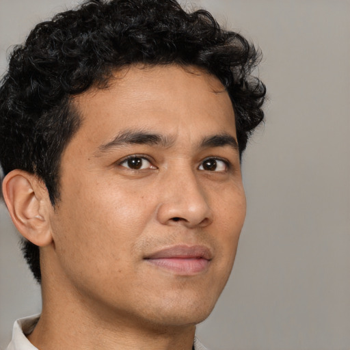 Neutral latino young-adult male with short  brown hair and brown eyes