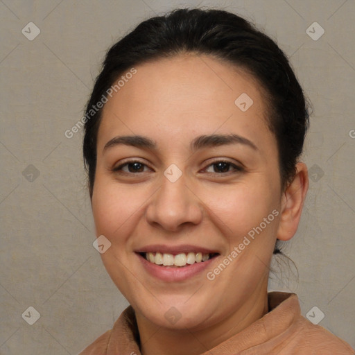 Joyful white young-adult female with short  brown hair and brown eyes