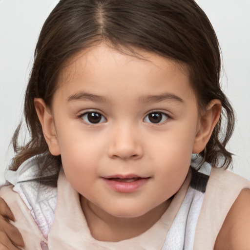 Joyful white child female with medium  brown hair and brown eyes