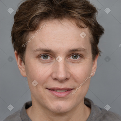 Joyful white adult female with short  brown hair and grey eyes