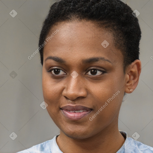 Joyful black young-adult female with short  brown hair and brown eyes