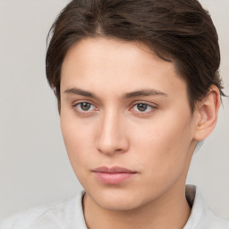 Neutral white young-adult female with short  brown hair and brown eyes