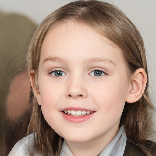 Joyful white child female with medium  brown hair and grey eyes