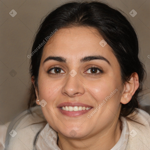 Joyful white adult female with medium  brown hair and brown eyes