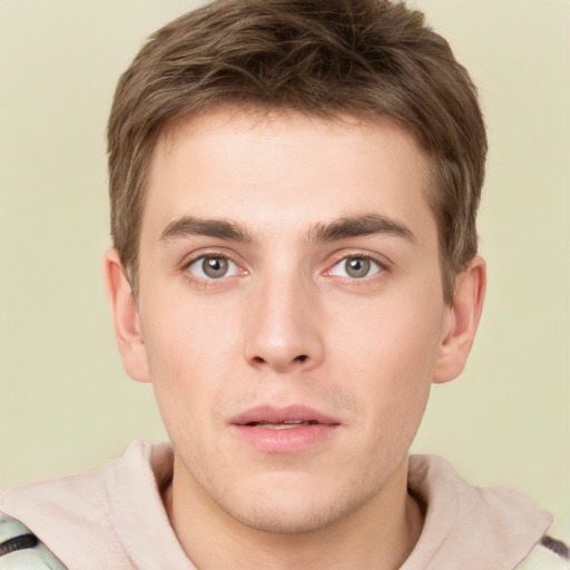 Neutral white young-adult male with short  brown hair and grey eyes