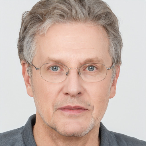 Neutral white middle-aged male with short  gray hair and grey eyes