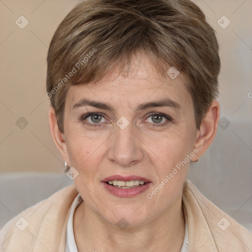 Joyful white adult female with short  brown hair and brown eyes