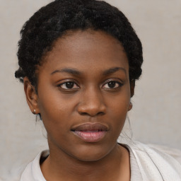 Neutral black young-adult female with short  brown hair and brown eyes