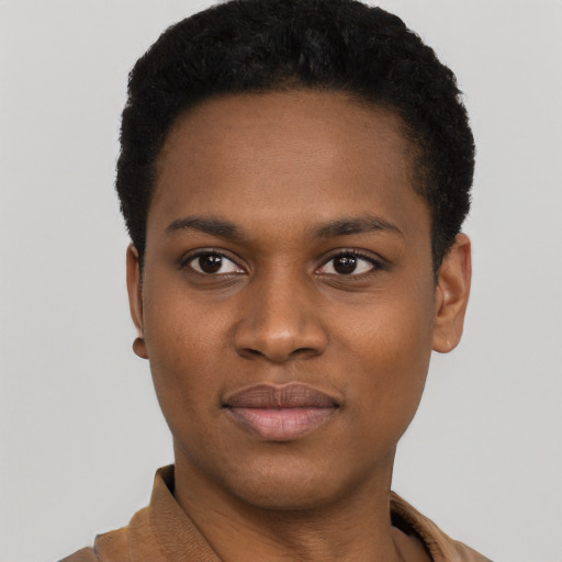 Joyful black young-adult female with short  black hair and brown eyes