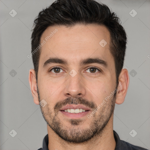 Joyful white young-adult male with short  black hair and brown eyes