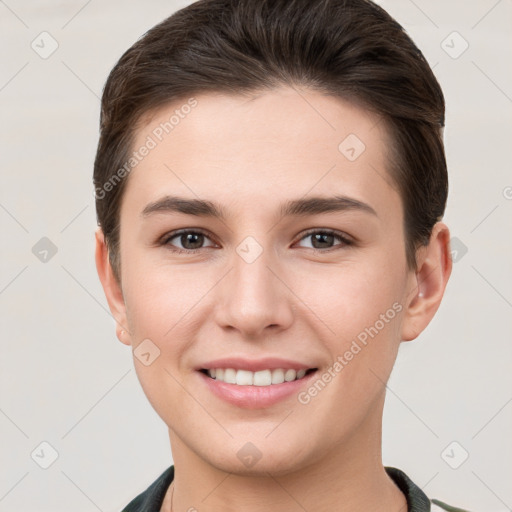 Joyful white young-adult female with short  brown hair and brown eyes