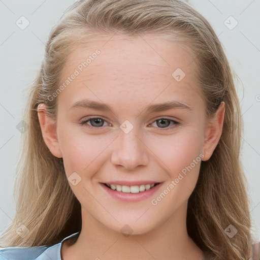 Joyful white young-adult female with long  brown hair and blue eyes