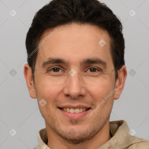 Joyful white adult male with short  brown hair and brown eyes