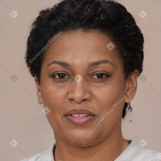 Joyful black adult female with short  brown hair and brown eyes
